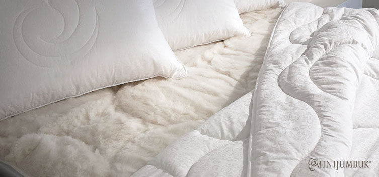 Benefits of sleeping with a wool mattress topper or underlay for back and hip pain