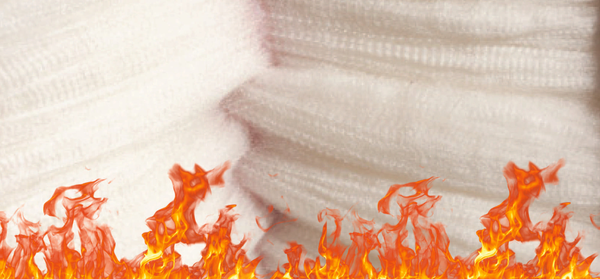 How wool is fire resistant compared to other fibres
