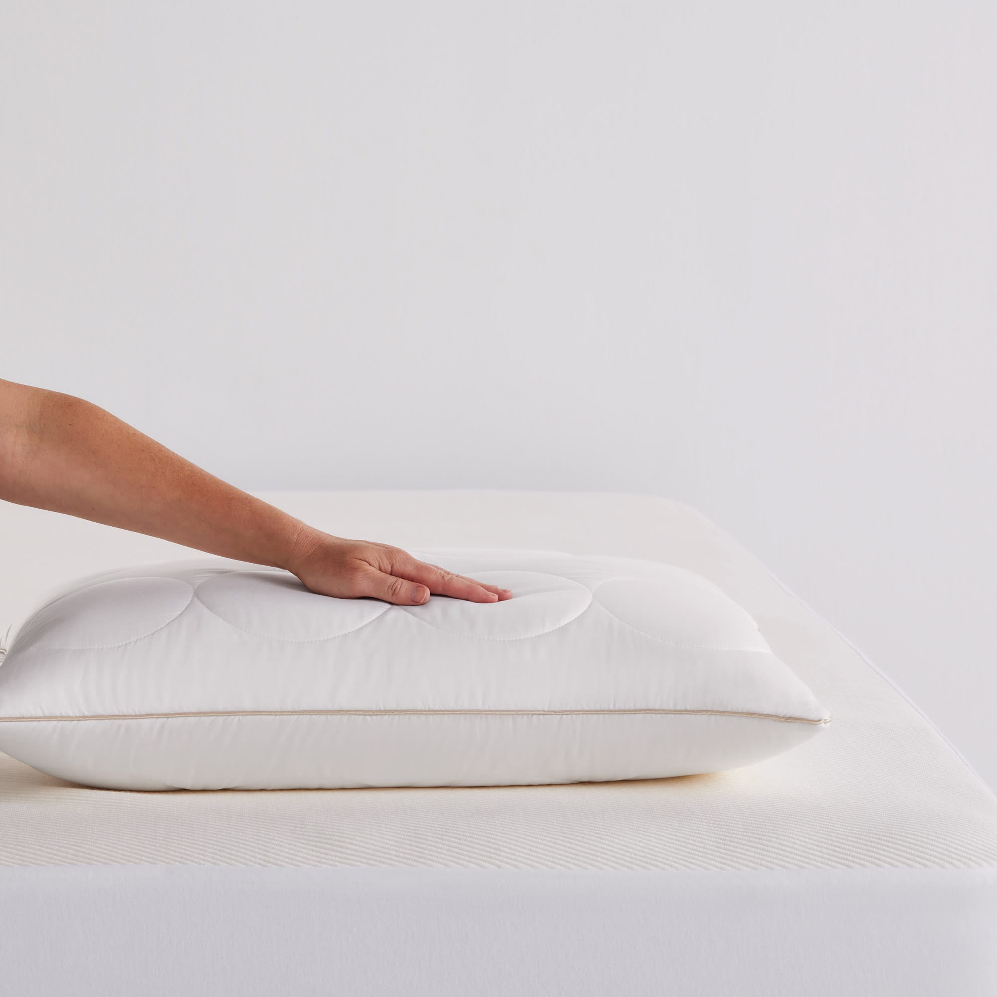CalmComfort Wool Low Pillow with hand - thumbnail #1