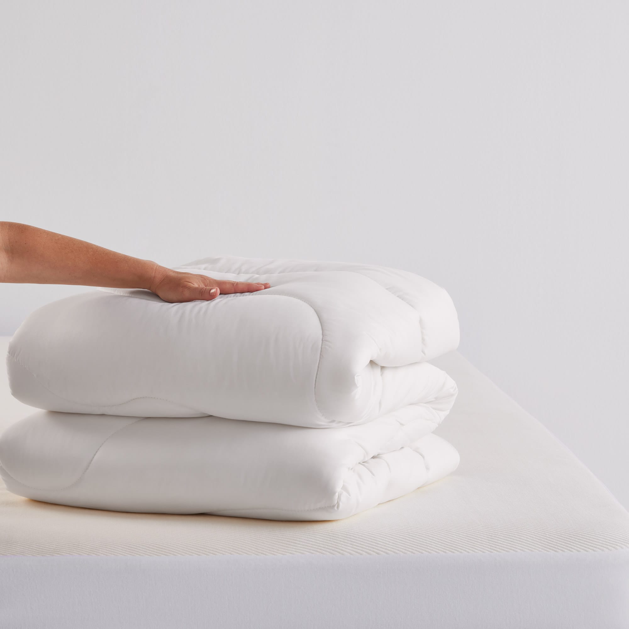 EverWarm Wool Quilt folded on bed - thumbnail #2