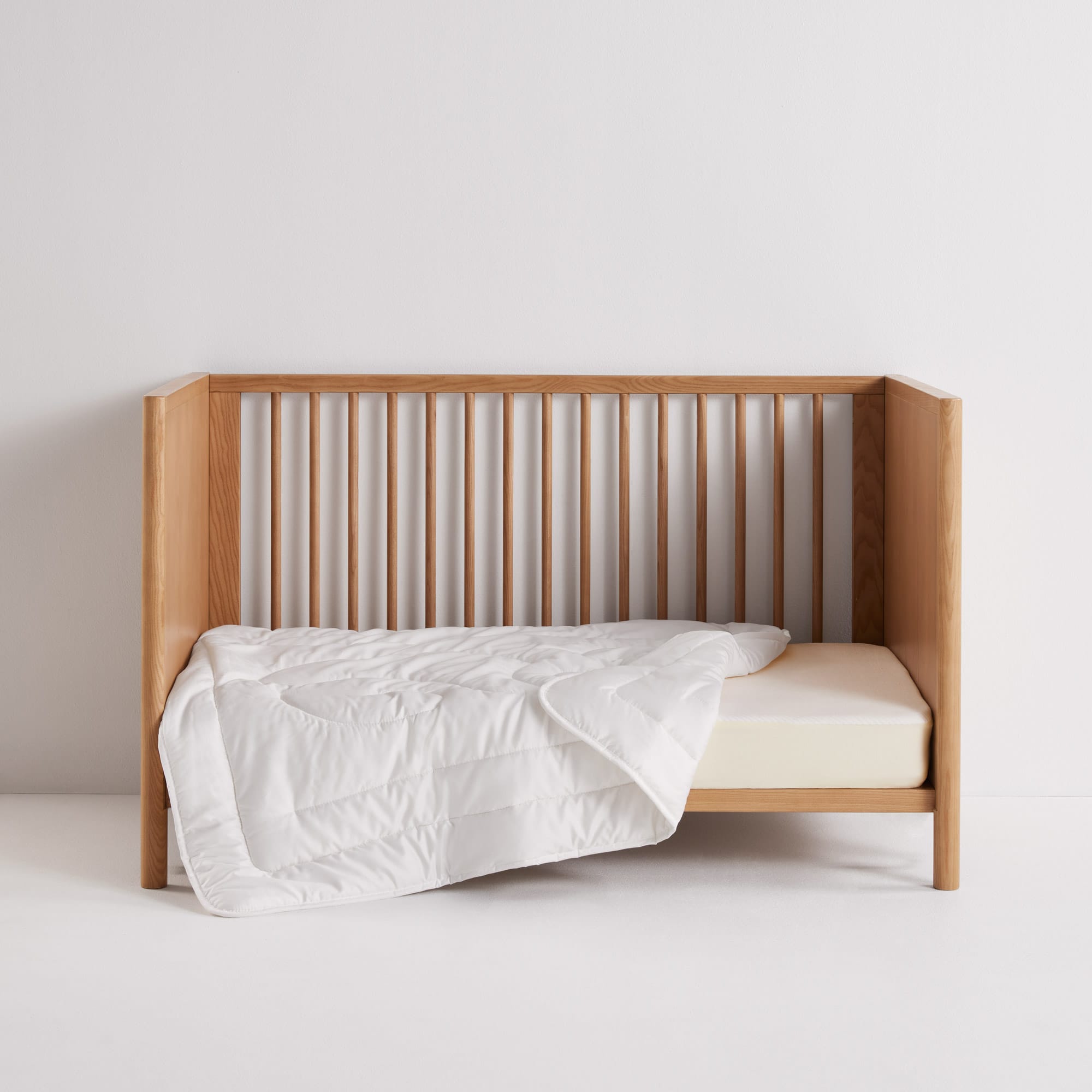 EveryNight Baby Quilt on cot - thumbnail #1