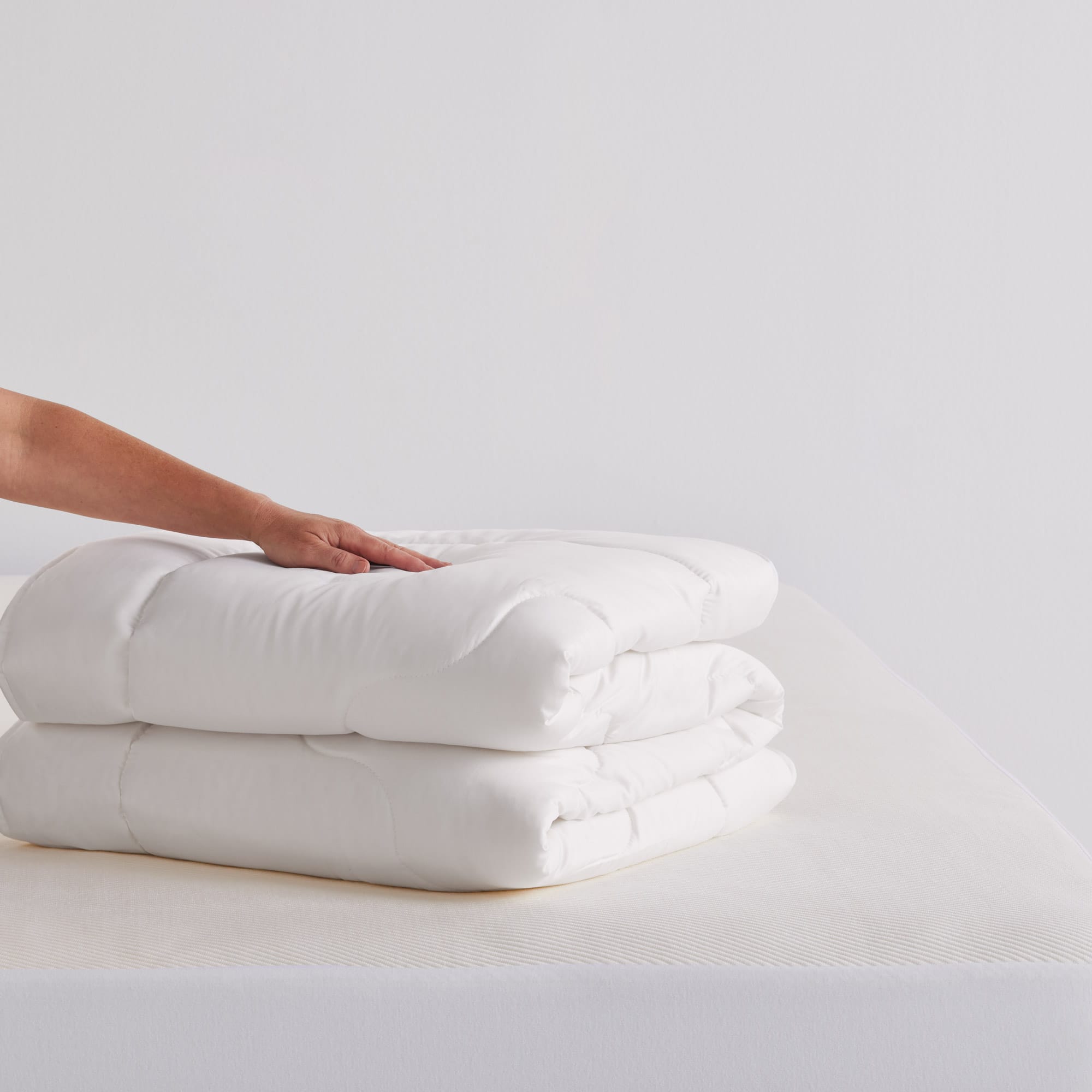 EveryNight Wool Quilt folded on bed - thumbnail #2